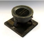 World War II era Air Force type Navigation Compass, with black dial and outer ring on tripod