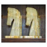 Pair of onyx horse design bookends, 22cm high