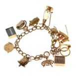 9ct gold curb-link charm bracelet set thirteen assorted gold and yellow metal charms, 35g gross
