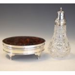 George V silver and tortoiseshell jewellery box having a hinged lid and standing on four feet,
