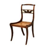19th Century beech framed simulated rosewood chair having cane seat and sabre front supports