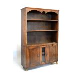 Oak open bookcase fitted two shelves with cupboards below, 97cm wide