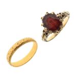 Unmarked yellow metal wedding band, size L, and unmarked yellow metal dress ring set red garnet-