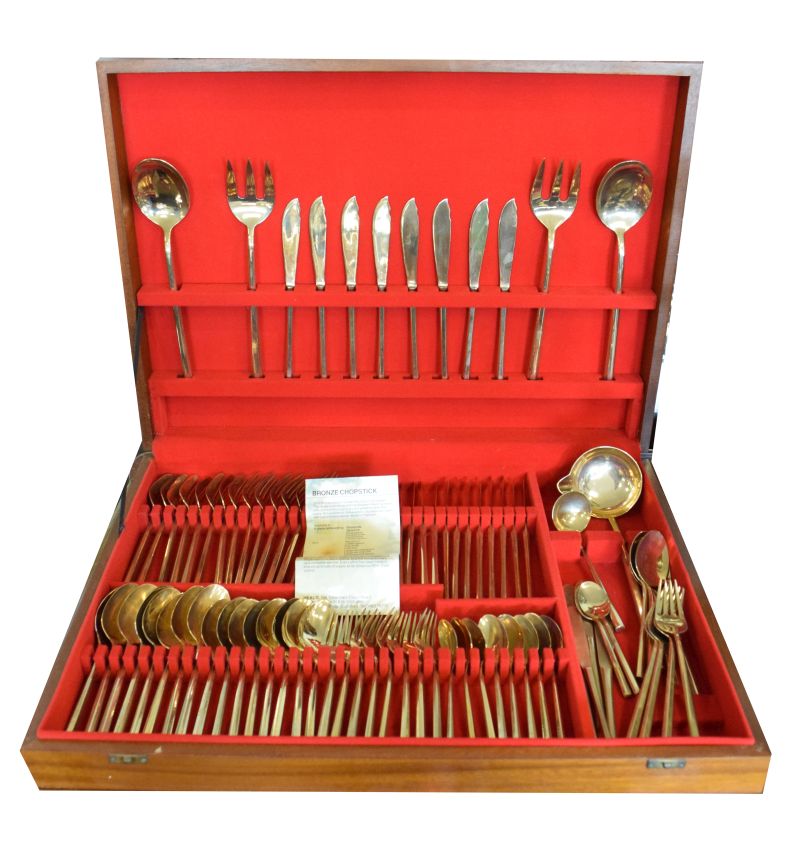 Heal's cutlery - 'Bronze chopstick' pattern canteen of cutlery in a red lined hardwood case, with