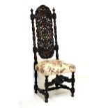 Late 19th/early 20th Century heavily carved oak high back Carolean style dining chair having stuff