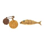 Three assorted yellow metal fobs comprising an articulated fish with turquoise eyes, stamped 375,