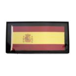 Spanish flag mounted in an ebonised frame, overall dimensions 90cm x 150cm