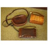 Lady's crocodile skin handbag, one other similarly mounted clutch bag, and one further handbag