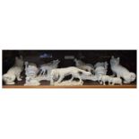 Quantity of bisque porcelain animal figures including stags pulling chariot