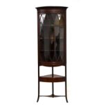 Early 20th Century mahogany bow front display cabinet supported on a 19th Century corner