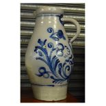 German salt glaze stoneware jug having hand painted blue floral decoration, 42.5cm high