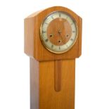 Early 20th Century light oak grandmother clock having striking and chiming movement, 132cm high