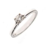 White metal solitaire diamond ring with claw-set brilliant, shank stamped 750, size N½, 3.4g gross