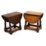 Two oak oval drop-leaf coffee tables