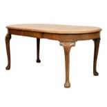 Early 20th Century walnut oval extending dining table fitted one insertion raised on cabriole