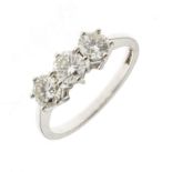 Three stone diamond 18ct white gold ring, the three uniform brilliant cuts calculated as totalling