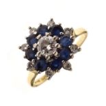 Diamond and sapphire cluster ring, in 18ct gold, the central brilliant cut estimated as weighing
