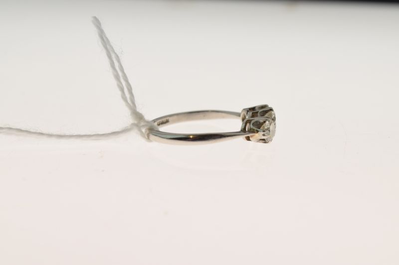 Three stone diamond ring, the white mount stamped 'atinum' having been sized, the graduated - Image 3 of 6