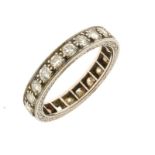 Diamond full eternity ring, with engraved sides to the unmarked white mount, the twenty brilliant