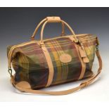 Mulberry tartan oil cloth and leather travel bag, having two leather handles, padlock and keys and