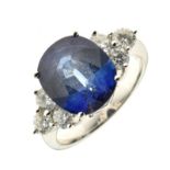 Sapphire and diamond ring, the diffused treated oval cut stone measuring approximately 12.2mm x 10.