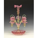 Victorian 'Vaseline' glass epergne, the central frilled pink trumpet vase with lemon glass scallop