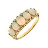 Five stone opal ring, stamped '18ct', with single cut diamond points between, size R, 5.9g gross