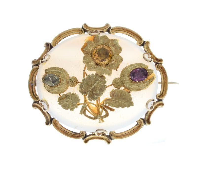 Victorian agate panel brooch, in unmarked gold, applied to the agate is a gem set foliate motif, 5.