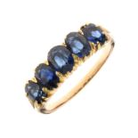 Five stone sapphire ring, circa 1900, the yellow mount unmarked, set with graduated oval cuts,