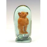 Rare Victorian green glass 'dump' paperweight, with cristallo-ceramie captive figure of a bear, 9.