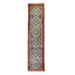 Middle Eastern (North West Persian) wool runner, the powder-blue field decorated with six large