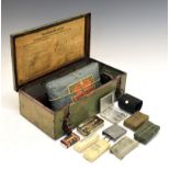 German Second World War vehicle first-aid kit (Vebandkasten), having red cross to top of metal tin