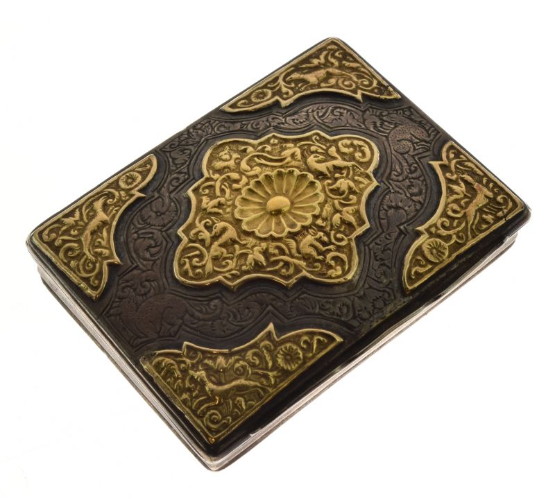 Persian white metal box, with engraved decoration, the hinged lid having gilt metal decorative