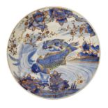 Early 20th Century Japanese porcelain charger, decorated with three carp fish in the Imari