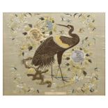 Late 19th Century Oriental-style silk work embroidery, depicting a stork or crane amidst flowers,