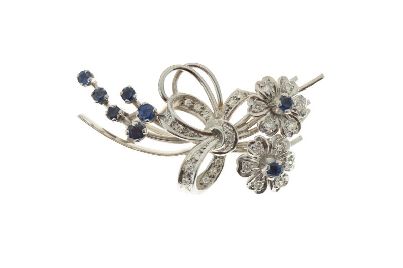 Diamond and sapphire spray brooch, in unmarked white metal, set throughout with twenty-nine small - Image 2 of 6