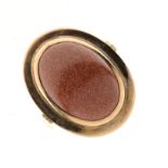 Goldstone set dress ring, stamped '9ct', size Q½, 7.7g gross Condition: The oval cabochon approx