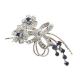Diamond and sapphire spray brooch, in unmarked white metal, set throughout with twenty-nine small