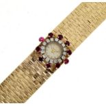 Beuche Girod - Lady's mechanical 9ct gold diamond and ruby set bracelet watch, the circular white