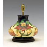 Modern Moorcroft pottery 'Orchid' pattern table lamp base, of squat bulbous form with tube-lined
