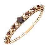 Garnet and cultured pearl 9ct gold Edwardian style hinged bangle, with alternate set frontispiece,