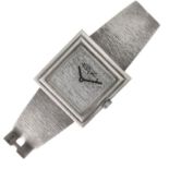 Roy C King- Silver mechanical bracelet watch, London 1973, the plain textured dial with black hands,