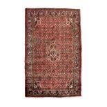 Middle Eastern Persian (Hamadan) wool rug or carpet, the brick-red field with central lobed