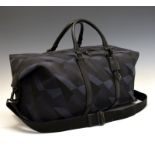 Large black and navy blue canvas Mulberry travelling bag, having black leather Mulberry tag and