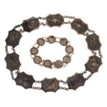 Chinese export silver choker necklace, unmarked, composed of ten embossed panels, 38.5cm long;