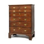 George III oak tall chest of drawers, the moulded rectangular top over two short and five