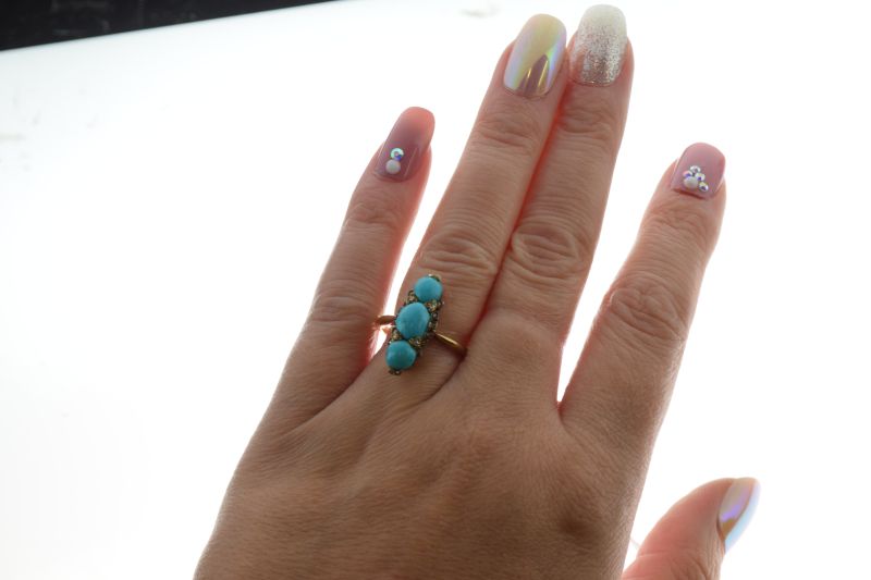 Turquoise three stone ring, the yellow mount unmarked, with rose diamond points, size O, 4.4g - Image 2 of 6