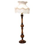 Turned fruitwood standard lamp with shade