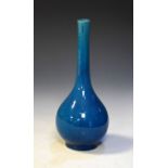 Oriental turquoise glazed pottery bottle shaped vase, 23.5cm high