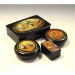 Group of Russian black-lacquered papier-mâché boxes (4)